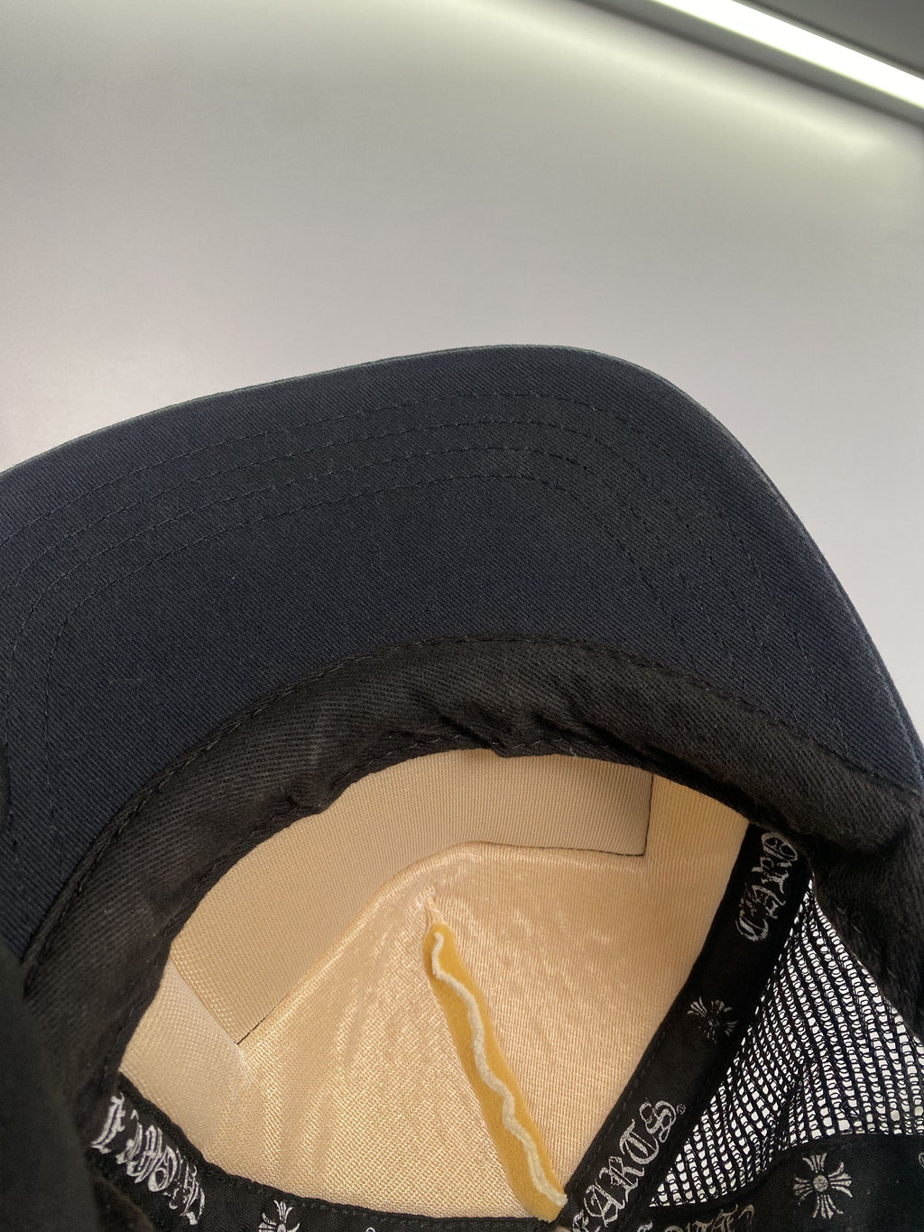 Chrome Hearts FUCK Hollywood Black Cream Trucker Hat