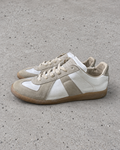 Maison Margiela GAT Original White Gum Sneakers EU41 — light grey concrete background