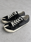 Maison Margiela Black Canvas Tabi Sneakers Size 37 — light grey concrete background